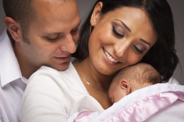 Happy Parents with Newborn Baby