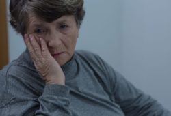 Portrait of older woman suffering for depression