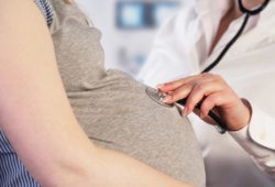 Doctor examining a pregnant woman